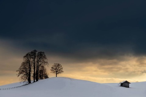 Winter landscape against a dramatic sky