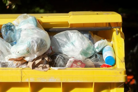 Yellow bin for plastic waste