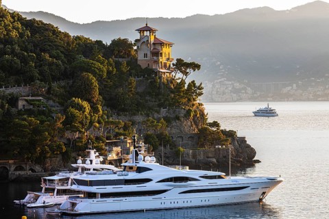 Luxury yachts anchored in the harbour of Portofino