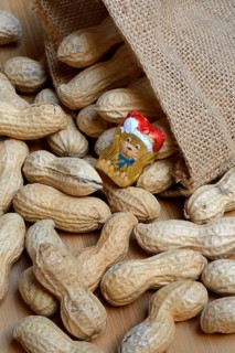 Peanuts and chocolate figure in sack