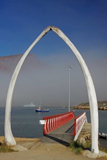 Whalebone gate in front of a jetty