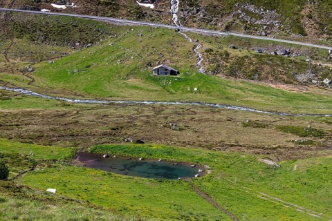 Small mountain lake near Tschuggen and Saess hut
