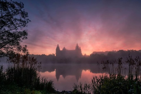 Johannisburg Castle reflected in the Main River