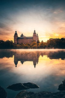 Johannisburg Castle reflected in the Main River