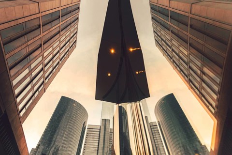 Skyscrapers reflected in a pane of glass