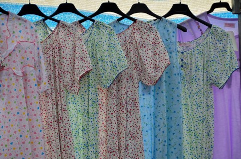Nightdresses on hangers at market