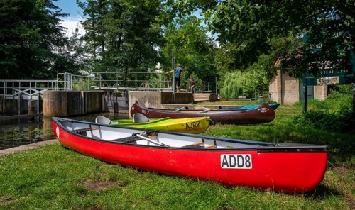Recreational sportsman with canoe at the Dubkower lock in the Spreewald