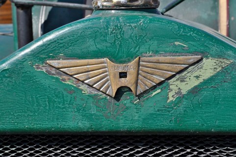 Hanomag logo on green metal from tractor