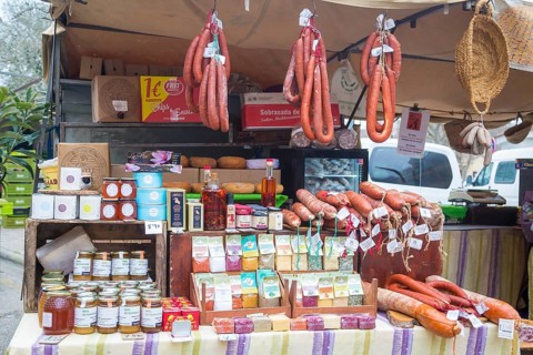 Market stall with sausages and local products