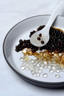 Aceto pearls with spoon in bowl