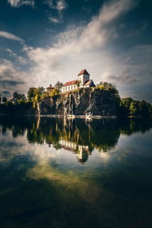 Beucha mountain church with reflection in the lake