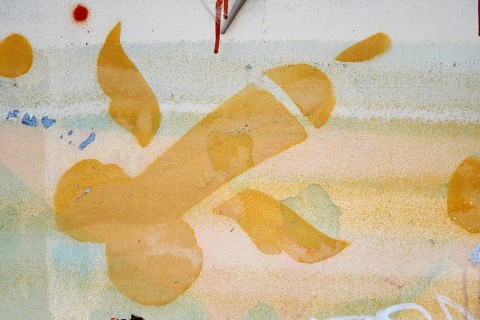 Flying phallic symbol with wings sprayed on wall
