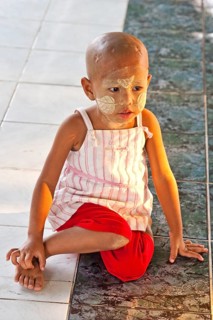 Boy with face painting with Tanaka paste