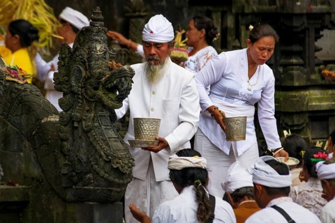 Devout Hindus at a ceremony in the temple