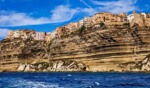 Steep coast of Bonifacio with old town on a limestone plateau