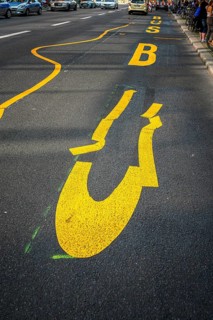 Crooked and crooked letters on a bus lane