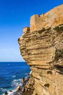 Steep coast of Bonifacio with old town on a limestone plateau