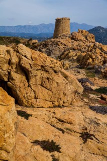 Genoese Tower in L'Ile-Rousse with the offshore island of La Pietra