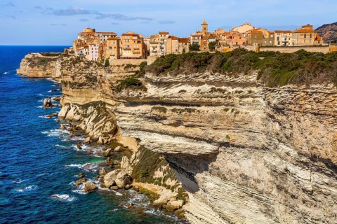 Steep coast of Bonifacio with old town on a limestone plateau