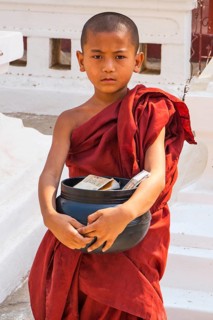Monk with begging bowl in Shwezigon Pagoda