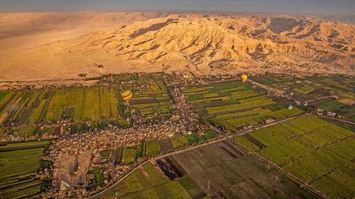 In the background Medinet Habu and Hatshepsut Temple