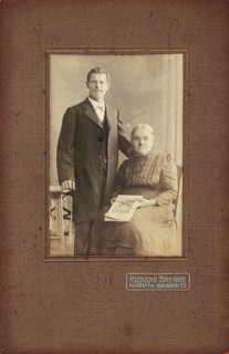 Historical photo of elderly couple around 1920
