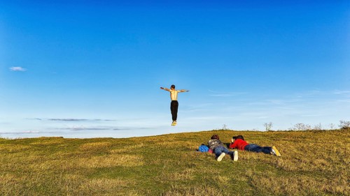 Young people on the edge of a cliff