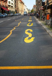 Crooked and crooked letters on a bus lane