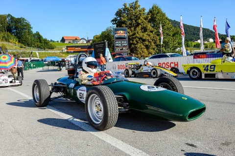 Historic race cars in waiting position