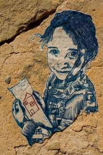 Children's pictures on the walls of the alleys