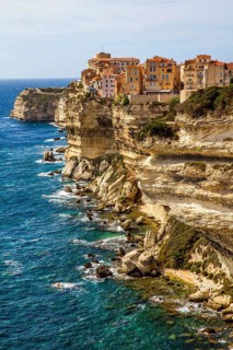 Steep coast of Bonifacio with old town on a limestone plateau
