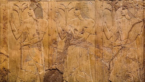Officials with papyrus stalks