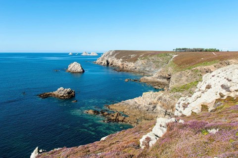 Rock islands in front of rocky coast