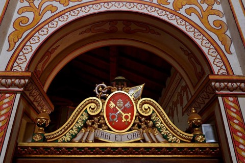 Coat of arms and motto of the Vatican in the mission church Catedral Inmaculada