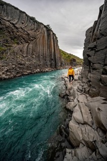 Tourist at Stuolagil Canyon