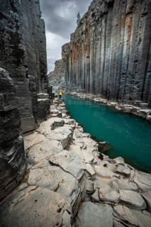 Tourist at Stuolagil Canyon