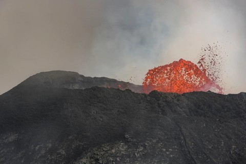Lava fountain spouting from crater
