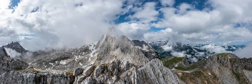 Hiker at the summit of the Westliche Toerlspitze