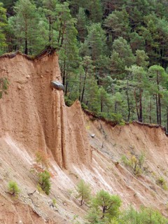Steep scarp with earth pyramid