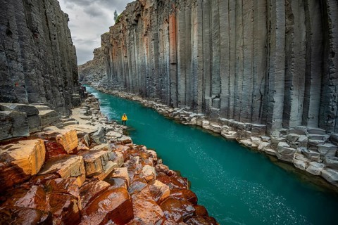Tourist at Stuolagil Canyon