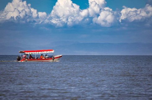 People sailing in a boat on Lake Nicaragua