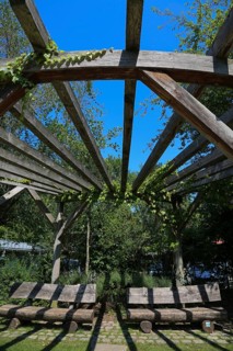 Wooden benches and pavilion in Donaupark