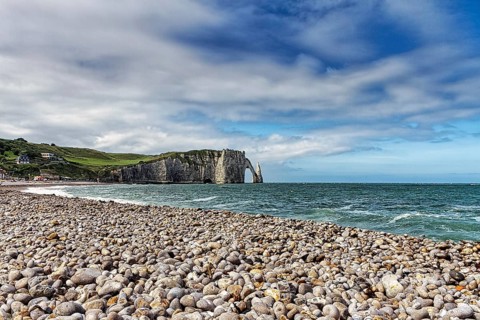 Stone beach with view of the chalk coast