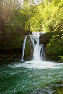 Waterfall and mossy rocks