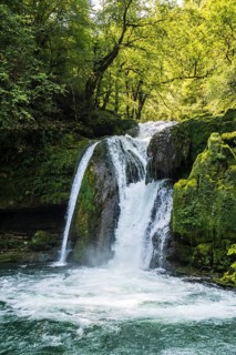 Waterfall and mossy rocks