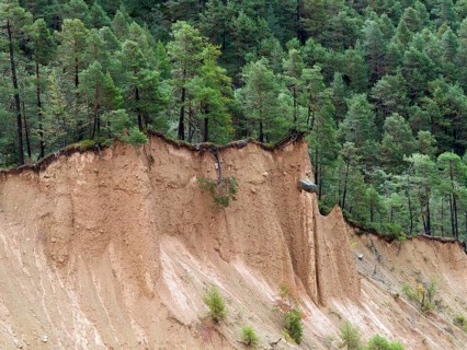 Steep scarp with earth pyramid
