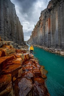 Tourist at Stuolagil Canyon