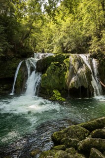 Waterfall and mossy rocks