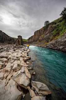 Tourist at Stuolagil Canyon