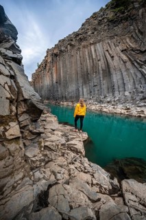 Tourist at Stuolagil Canyon